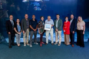 Ray poses with his award and the MARACOOS board leadership